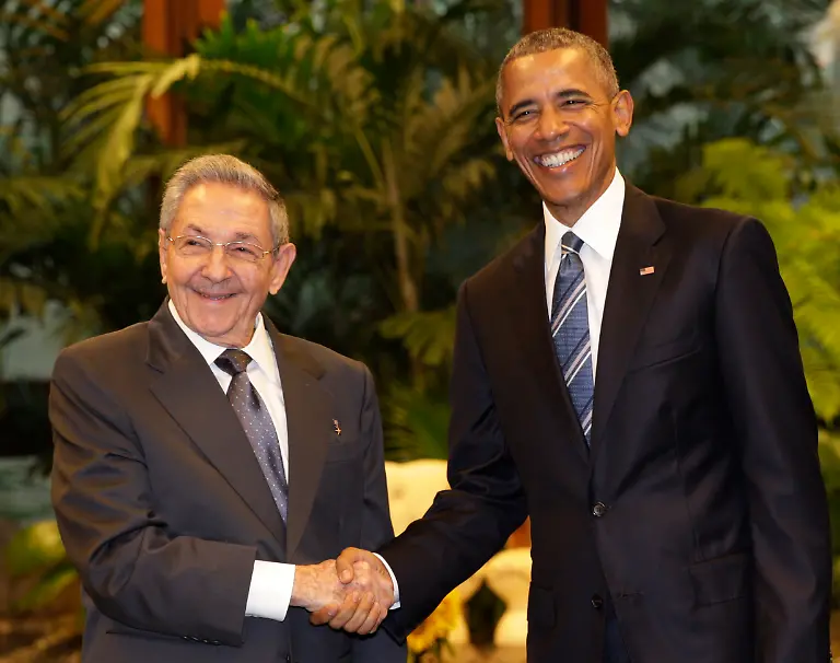Cuban-President-Raul-Castro-left-shakes-hands-with-U-S-President-Barack-Obama-during-a-meeting-in-Revolution-Palace-Monday-March-21-2016-Brushing-past-profound-differences-President-Obama-and-President-Castro-sat-down-for-a-historic-meeting-offering-critical-clues-about-whether-Obama-s-sharp-U-turn-in-policy-will-be-fully-reciprocated