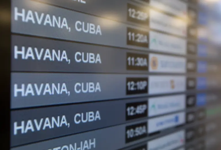 Charter-flights-from-Miami-to-Havana-are-shown-on-a-departures-monitor-at-Miami-International-Airport-Friday-Jan-16-2015-in-Miami-Following-through-on-its-declaration-of-warming-ties-with-Cuba-the-Obama-administration-has-eased-travel-restrictions-and-opened-a-wide-range-of-new-export-opportunities-with-the-communist-island