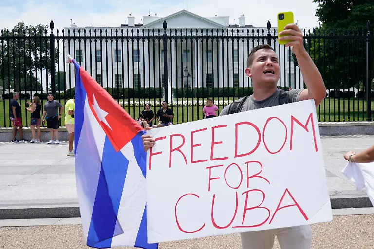 People-participate-in-a-rally-outside-the-White-House-in-Washington-Tuesday-July-13-2021-in-support-of-the-protesters-in-Cuba