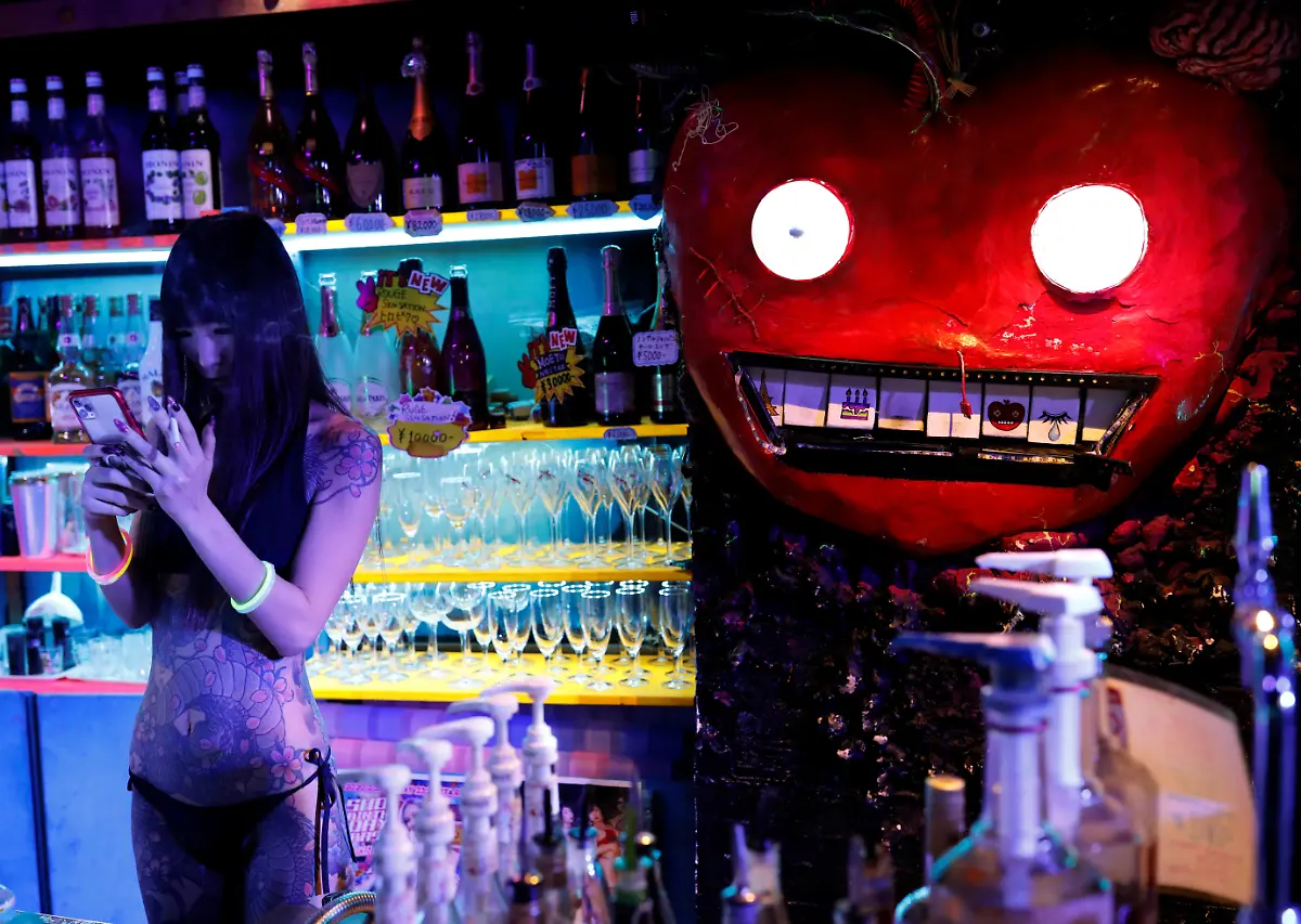 2020-10-26T230441Z-1428890459-RC2NQJ9Y220H-RTRMADP-3-JAPAN-TATTOOS