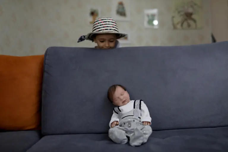 2020-10-22T133216Z-649883083-RC2ONJ9PI4W8-RTRMADP-3-IRAN-FAMILIES-DOLLS