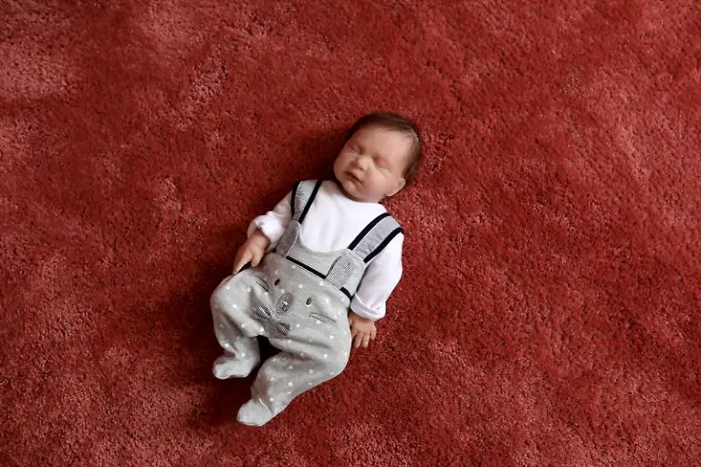 2020-10-22T121227Z-1739701380-RC2ONJ9T2UCW-RTRMADP-3-IRAN-FAMILIES-DOLLS