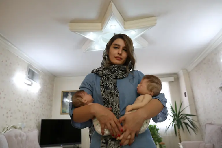 2020-10-22T133217Z-165434562-RC2ONJ9L0152-RTRMADP-3-IRAN-FAMILIES-DOLLS