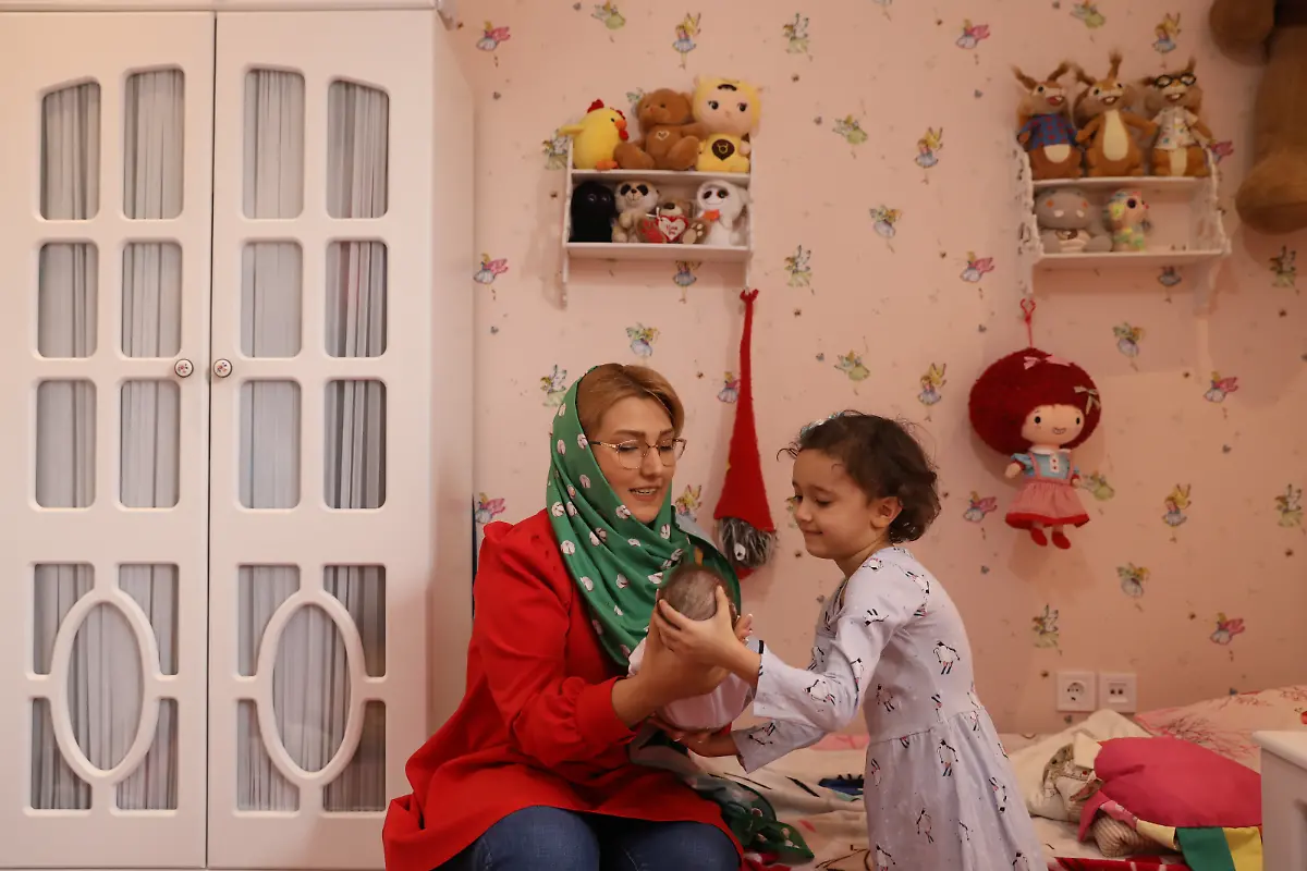 2020-10-22T121126Z-1361554605-RC2ONJ9ZW92R-RTRMADP-3-IRAN-FAMILIES-DOLLS