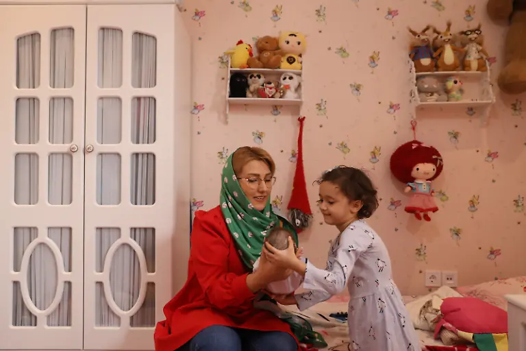 2020-10-22T121126Z-1361554605-RC2ONJ9ZW92R-RTRMADP-3-IRAN-FAMILIES-DOLLS