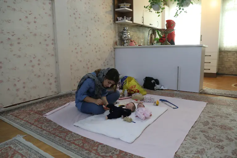 2020-10-22T121003Z-2096976119-RC2ONJ9VIAX6-RTRMADP-3-IRAN-FAMILIES-DOLLS