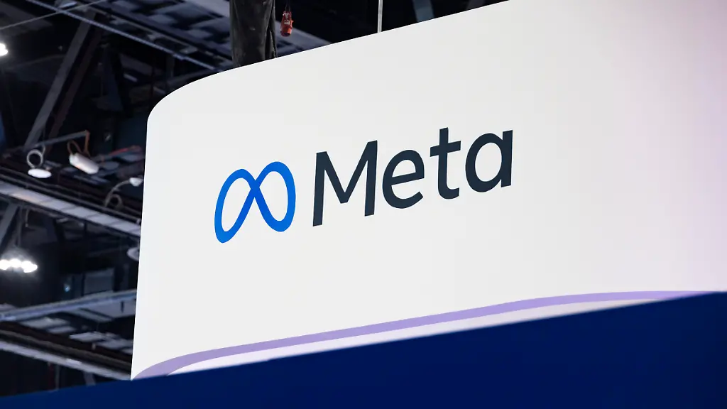 Meta-exhibition-stand-with-the-logo-of-the-technology-company-Meta-Platforms-owns-and-operates-several-social-media-platforms-and-communication-services-including-Facebook-Instagram-WhatsApp-Messenger-Threads-Meta-has-headquarters-in-California-USA-and-is-considered-Big-Tech-company-listed-as-one-of-the-world-s-largest-public-companies-aiming-to-a-strategic-shift-toward-developing-the-metaverse-an-interconnected-digital-ecosystem-spanning-virtual-and-augmented-reality-technologies-with-products-like-the-Ray-Ban-Meta-a-series-of-AI-glasses-created-by-Meta-Platforms-and-EssilorLuxottica-Tech-companies-booths-at-the-BRIDGE-Summit-2025-at-Abu-Dhabi-National-Exhibition-Centre-ADNEC-BRIDGE-Summit-in-the-UAE-is-a-major-global-media-entertainment-and-technology-conference-Abu-Dhabi-United-Arab-Emirates-on-December-10-2025