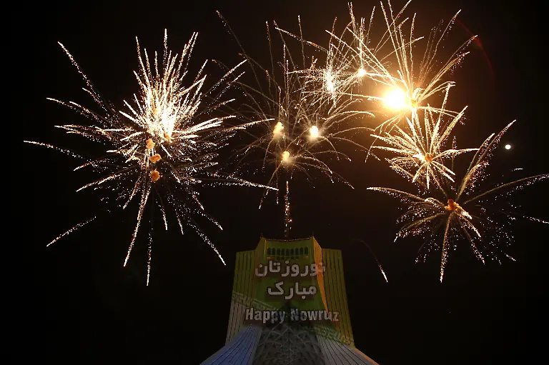 TEHRAN-IRAN-MARCH-14-Artists-from-different-ethnic-groups-perform-traditional-music-and-dance-during-the-opening-ceremony-of-the-International-Nowruz-Festival-at-Azadi-Square-in-Tehran-Iran-on-March-14-2025-The-event-attended-by-ambassadors-cultural-figures-and-citizens-marks-the-start-of-the-Persian-New-Year-celebrations
