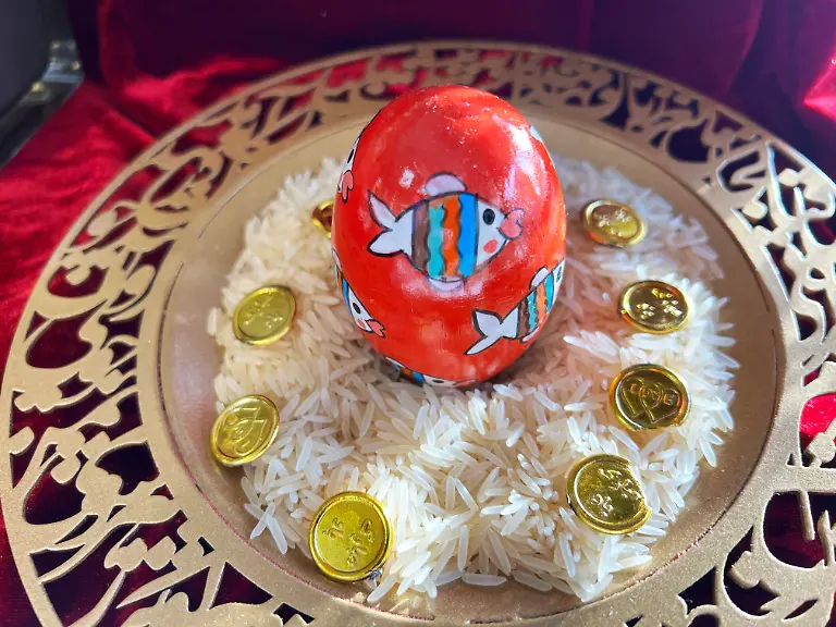 Traditional-items-adorn-a-Haft-Sin-Haft-Seen-an-arrangement-of-seven-symbolic-items-that-all-begin-with-the-letter-S-in-Farsi-during-Nowruz-celebrations-in-Richmond-Hill-Canada-on-March-13-2025-Nowruz-which-means-new-day-marks-the-first-day-of-spring-and-is-also-celebrated-in-Iran-Afghanistan-Azerbaijan-Albania-Bashkortostan-Bahrain-Georgia-Turkmenistan-Tajikistan-Uzbekistan-Kyrgyzstan-and-Kazakhstan-as-well-as-among-various-other-Iranian-and-Turkic-peoples-in-Iraqi-Kurdistan-Syria-Lebanon-Pakistan-India-northwestern-China-the-Caucasus-the-Crimea-and-the-Balkans-Photo-by-Creative-Touch-Imaging-Ltd