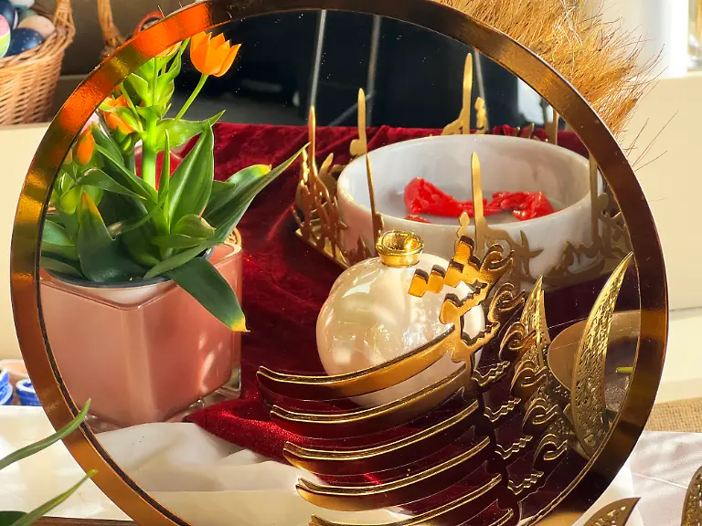 Traditional-items-adorn-a-Haft-Sin-Haft-Seen-an-arrangement-of-seven-symbolic-items-that-all-begin-with-the-letter-S-in-Farsi-during-Nowruz-celebrations-in-Richmond-Hill-Canada-on-March-13-2025-Nowruz-which-means-new-day-marks-the-first-day-of-spring-and-is-also-celebrated-in-Iran-Afghanistan-Azerbaijan-Albania-Bashkortostan-Bahrain-Georgia-Turkmenistan-Tajikistan-Uzbekistan-Kyrgyzstan-and-Kazakhstan-as-well-as-among-various-other-Iranian-and-Turkic-peoples-in-Iraqi-Kurdistan-Syria-Lebanon-Pakistan-India-northwestern-China-the-Caucasus-the-Crimea-and-the-Balkans-Photo-by-Creative-Touch-Imaging-Ltd