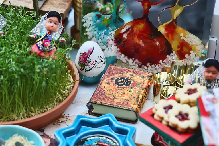Traditional-items-adorn-a-Haft-Sin-Haft-Seen-an-arrangement-of-seven-symbolic-items-that-all-begin-with-the-letter-S-in-Farsi-displayed-during-the-Nowruz-Bazaar-a-Persian-New-Year-market-during-Nevruz-celebrations-in-Toronto-Canada-on-March-1-2025-Nevruz-also-known-as-Norooz-Nourooz-Newroz-or-Nowruz-means-new-day-and-marks-the-first-day-of-Spring-It-is-also-celebrated-in-Iran-Afghanistan-Azerbaijan-Albania-Bashkortostan-Bahrain-Georgia-Turkmenistan-Tajikistan-Uzbekistan-Kyrgyzstan-and-Kazakhstan-as-well-as-among-various-other-Iranian-and-Turkic-peoples-in-Iraqi-Kurdistan-Syria-Lebanon-Pakistan-India-northwestern-China-the-Caucasus-the-Crimea-and-the-Balkans-Photo-by-Creative-Touch-Imaging-Ltd