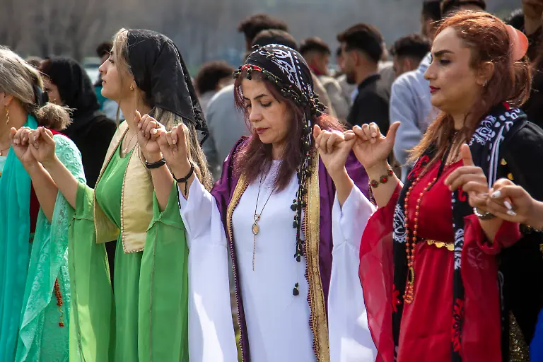 April-4-2025-Kurdistan-Kurdistan-Iran-People-in-KURDISTAN-Iran-gather-in-villages-and-mountains-to-celebrate-Nowruz-the-Kurdish-New-Year-festival-that-dates-back-more-than-6-000-years-Wearing-colorful-traditional-clothes-men-and-women-of-all-ages-dance-sing-share-food-and-light-fires-as-symbols-of-spring-renewal-and-freedom-Across-Kurdistan-thousands-come-together-to-keep-alive-this-cultural-heritage-Women-and-men-play-equal-roles-in-the-celebration-passing-traditions-across-generations-Nowruz-in-Kurdistan-is-not-only-a-holiday-but-also-a-symbol-of-identity-resilience-and-the-deep-connection-between-people-nature-and-history