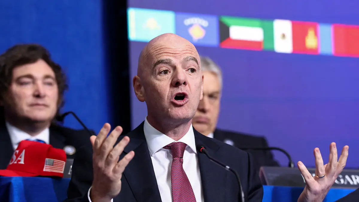 FIFA-president-Gianni-Infantino-speaks-as-he-and-Argentina-s-President-Javier-Milei-attend-the-inaugural-Board-of-Peace-meeting-at-the-U-S-Institute-of-Peace-in-Washington-D-C-U-S-February-19-2026