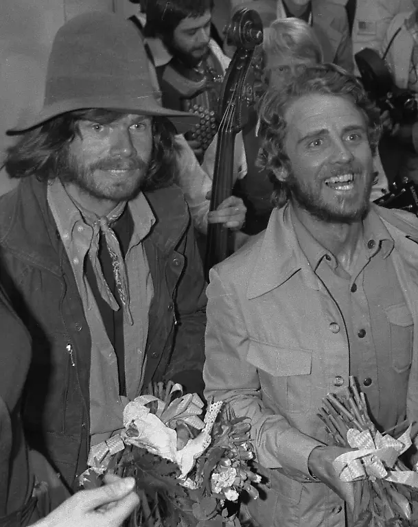 The-mountaineers-from-Tyrol-Austria-Reinhold-Messner-33-left-and-Peter-Habeler-35-are-pictured-at-the-airport-in-Munich-West-Germany-May-22-1978-after-climbing-the-highest-peak-of-the-world-Mount-Everest-in-Nepal-without-oxygen-equipment-They-were-welcomed-by-a-band-playing-music-relatives-and-fans