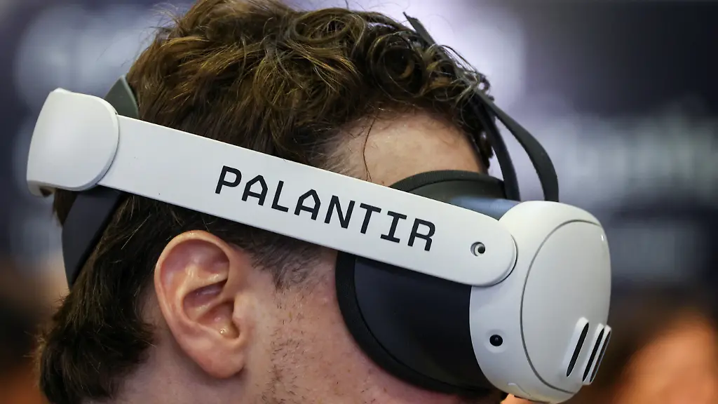 A-man-tries-the-Palantir-Maven-Smart-System-during-the-Defence-Security-Equipment-International-DSEI-Japan-at-Makuhari-Messe-in-Chiba-east-of-Tokyo-Japan-May-21-2025