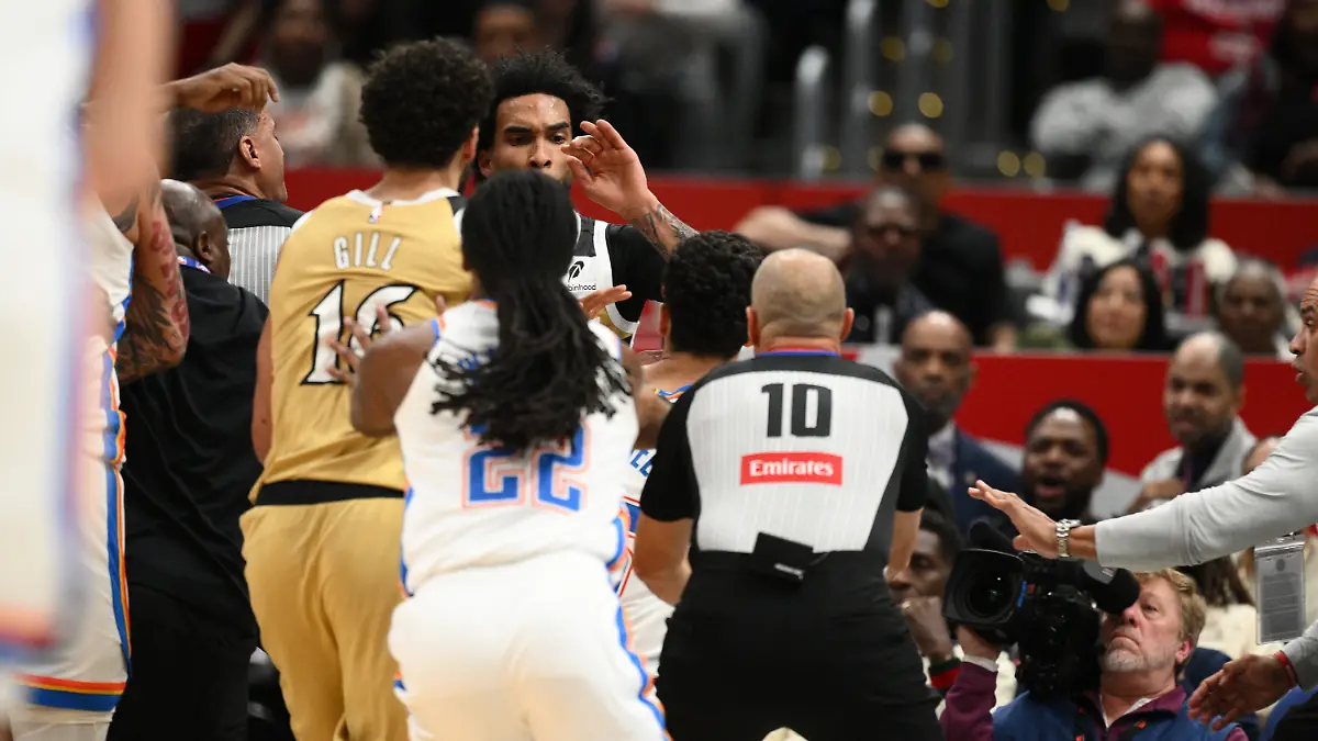 Members-of-the-Oklahoma-City-Thunder-and-the-Washington-Wizards-scuffle-during-the-first-half-of-an-NBA-basketball-game-Saturday-March-21-2026-in-Washington