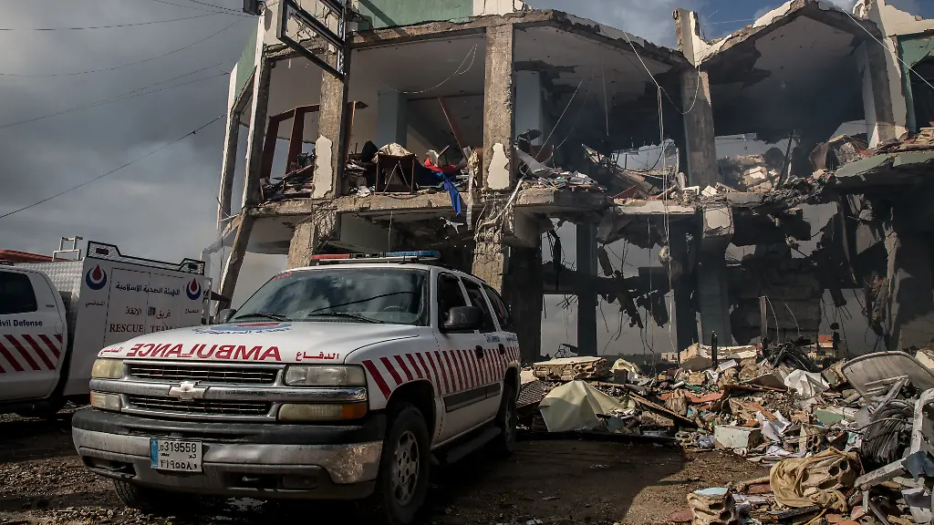March-16-2026-Lebanon-An-ambulance-parked-in-front-of-what-remains-of-the-medical-centre-in-Bourj-Qalaway-southern-Lebanon-where-12-medics-including-doctors-paramedics-and-nurses-were-killed-in-an-Israeli-attack-At-least-850-people-in-Lebanon-have-been-killed-since-Israel-and-Hezbollah-returned-to-all-out-war-including-32-healthcare-workers-according-to-Lebanon-s-ministry-of-health