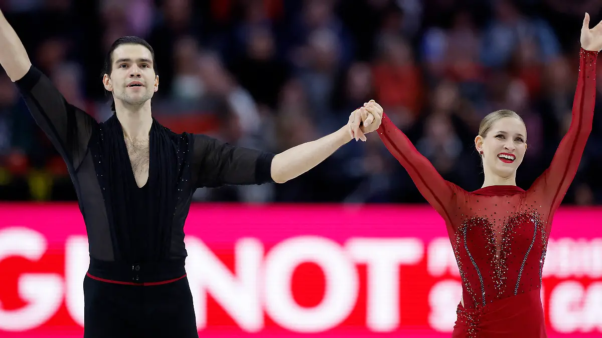 Figure-Skating-ISU-Figure-Skating-World-Championships-O2-arena-Prague-Czech-Republic-March-25-2026-Germany-s-Minerva-Fabienne-Hase-and-Nikita-Volodin-react-after-their-performance-during-the-Pair-s-Short-Program-REUTERS-David-W-Cerny