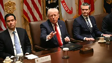 AFP__20260326__A4U73GD__v1__HighRes__UsPresidentDonaldTrumpMeetsWithMembersOfHisCabi