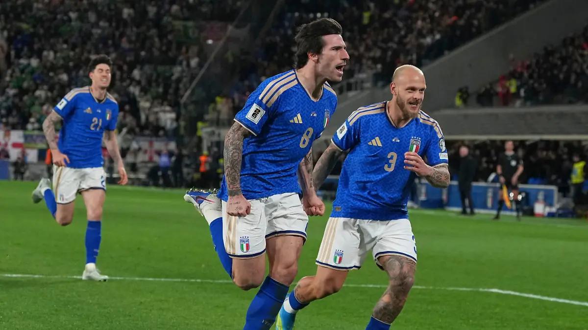 Italy-s-Federico-Dimarco-right-celebrates-with-teammate-Sandro-Tonali-who-scored-his-side-s-first-goal-during-the-World-Cup-qualifying-play-off-soccer-match-between-Italy-and-Northern-Ireland-in-Bergamo-Italy-Thursday-March-26-2026