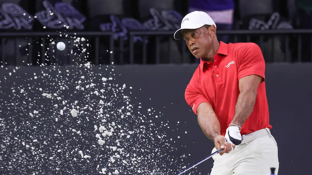Tiger-Woods-hits-a-practice-shot-from-a-bunker-before-the-TGL-SoFi-Cup-finals-in-Palm-Beach-Gardens-Fla-Tuesday-March-24-2026