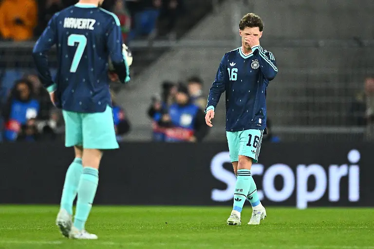 27-03-2026-Schweiz-Basel-Fussball-Maenner-Laenderspiele-Schweiz-Deutschland-St-Jakob-Park-Angelo-Stiller-Deutschland-reagiert-nach-dem-1-0-Foto-Tom-Weller-dpa-WICHTIGER-HINWEIS-Gemaess-den-Vorgaben-der-DFL-Deutsche-Fussball-Liga-bzw-des-DFB-Deutscher-Fussball-Bund-ist-es-untersagt-in-dem-Stadion-und-oder-vom-Spiel-angefertigte-Fotoaufnahmen-in-Form-von-Sequenzbildern-und-oder-videoaehnlichen-Fotostrecken-zu-verwerten-bzw-verwerten-zu-lassen