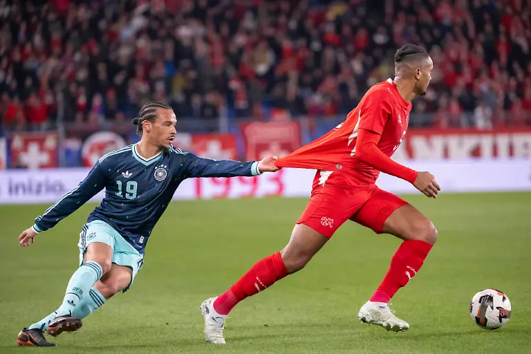 Soccer-International-Friendly-Laenderspiel-Nationalmannschaft-Matches-Switzerland-vs-Germany-Germany-s-Leroy-Sane-left-against-Switzerland-s-Manuel-Akanji-right-during-a-friendly-soccer-match-between-Switzerland-and-Germany-at-the-St-Jakob-Park-stadium-in-Basel-Switzerland-27-March-2026