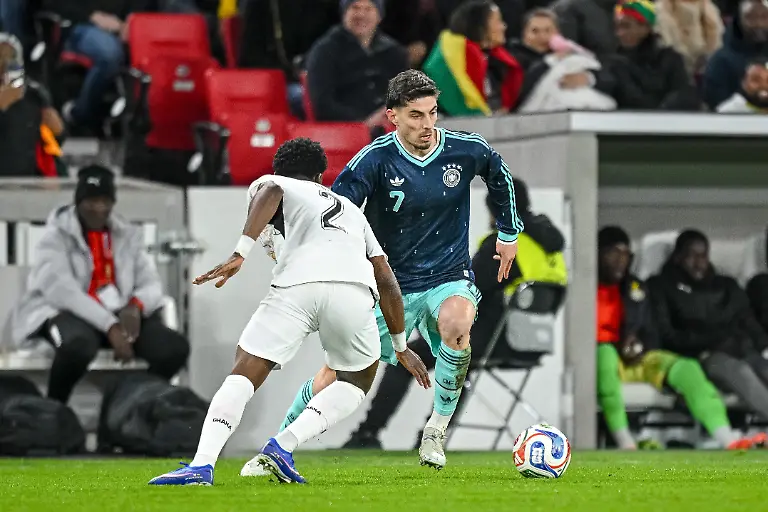 Derrick-Koehn-Ghana-and-Kai-Havertz-Germany-battle-for-the-ball-during-the-international-friendly-match-between-Germany-and-Ghana-at-MHP-Arena-on-March-30-2026-in-Ludwigsburg-Germany