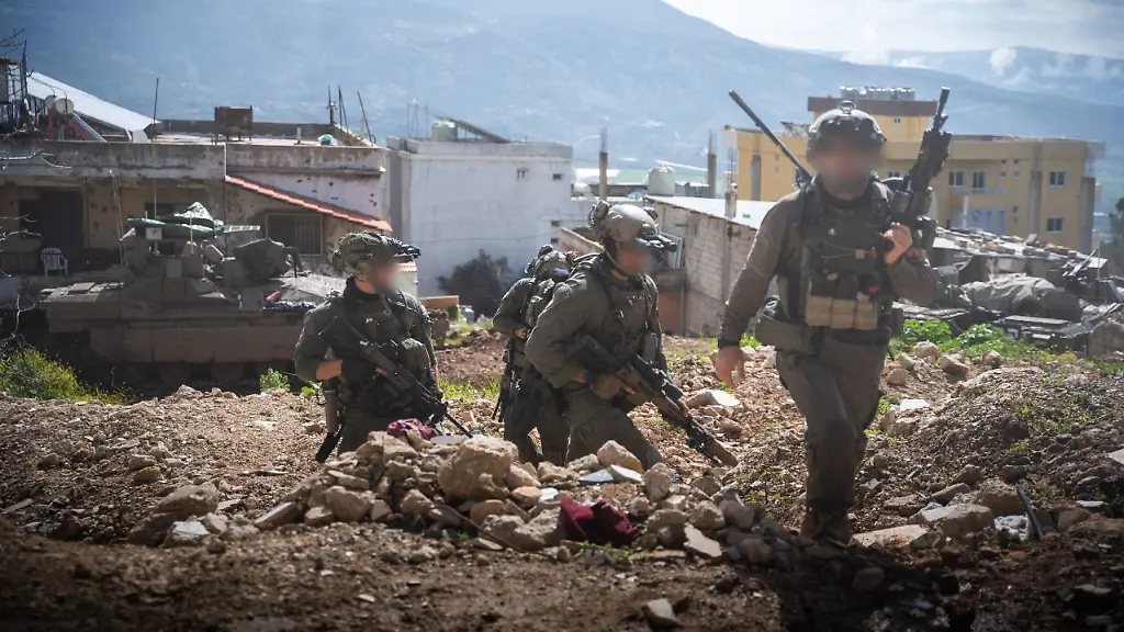 Southern-Lebanon-30-03-2026-The-Israel-Defense-Forces-IDF-reported-that-naval-commandos-from-Shayetet-13-operating-alongside-Givati-Brigade-troops-during-targeted-ground-operations-in-the-Al-Khiyam-area-located-what-it-described-as-hundreds-of-weapons-stored-inside-a-school-building-According-to-the-IDF-the-cache-allegedly-included-anti-tank-rockets-mortar-shells-grenades-launchers-small-arms-explosive-devices-and-related-materials-The-military-also-stated-that-items-bearing-United-Nations-markings-were-observed-at-the-site-The-IDF-attributed-the-presence-of-the-weapons-to-Hezbollah-which-it-accused-of-embedding-military-infrastructure-within-civilian-locations-04SIPA-Sipa