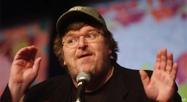 Michael-Moore-stellte-in-Filmen-und-Buechern-mit-umstrittenen-Mitteln-Bush-als-ausgemachten-Volltrottel-hin