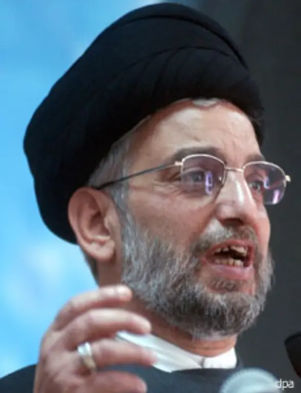 Viele-Anhaenger-der-SCIRI-Partei-moechten-anders-als-die-Dawa-Partei-einen-Gottesstaat-auf-irakischem-Boden-Hakim-unterhaelt-gute-Kontakte-in-den-Iran