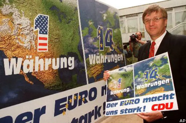 Aehnlich-spektakulaer-allerdings-deutlich-staerker-umstritten-ist-die-Einfuehrung-des-Euro-als-real-existierendes-Zahlungsmittel-am-1-Januar-2002-Nicht-nur-der-von-Deutschland-vorgeschlagene-Name-ist-ein-Kunstprodukt