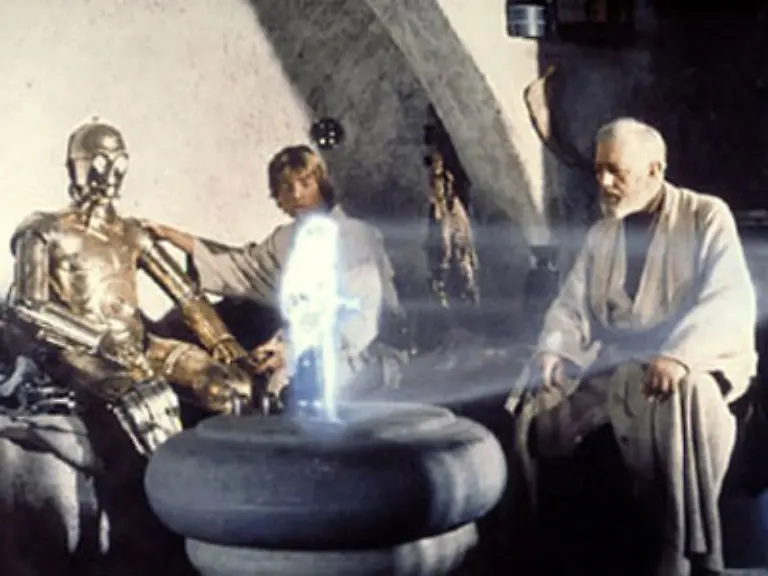 Gefangen-von-Geschoepfen-namens-Jawas-werden-sie-an-Owen-Lars-verkauft-Dessen-Neffe-ist-ausgerechnet-Luke-Skywalker-Luke-entdeckt-zufaellig-Leias-Botschaft-an-Obi-Wan-und-ist-fasziniert-In-der-Nacht-reisst-R2-D2-aus-verfolgt-von-Luke-und-C-3PO-um-Obi-Wan-Kenobi-zu-finden