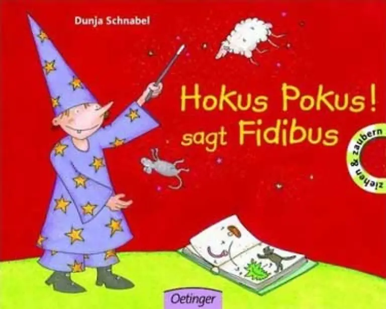 Eine-wunderbare-Geschichte-erzaehlt-Dunja-Schnabel-Der-kleine-Zauberer-Fidibus-will-sich-eine-Katze-zaubern-aber-irgendwie-klappt-das-nicht-so-recht-Gereimt-und-mit-Schiebern-zum-Zaubern-von-Oetinger-fuer-7-90-Euro