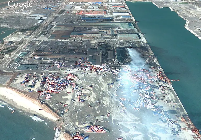 Piled-Up-Shipping-Containers-on-Docks-3-13-11