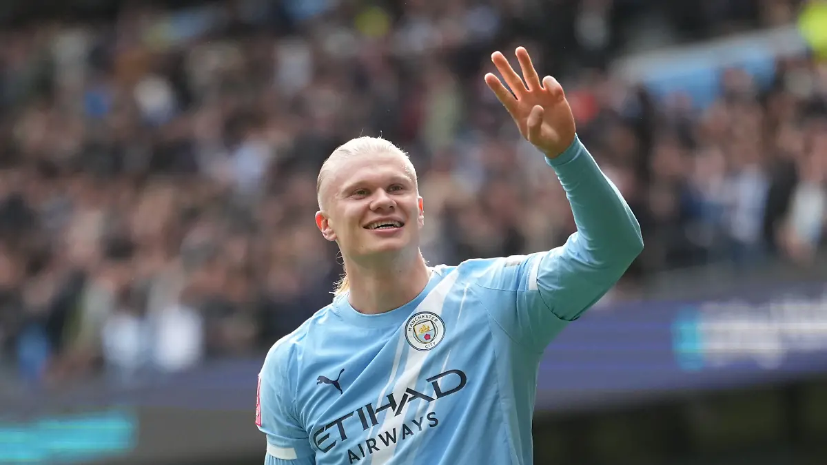Manchester-City-s-Erling-Haaland-celebrates-after-scoring-his-third-goal-during-the-FA-Cup-quarter-final-soccer-match-between-Manchester-City-and-Liverpool-in-Manchester-England-Saturday-April-4-2026