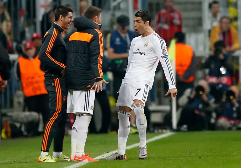 Real-s-Cristiano-Ronaldo-right-celebrates-scoring-his-side-s-4th-goal-during-the-Champions-League-semifinal-second-leg-soccer-match-between-Bayern-Munich-and-Real-Madrid-at-the-Allianz-Arena-in-Munich-southern-Germany-Tuesday-April-29-2014