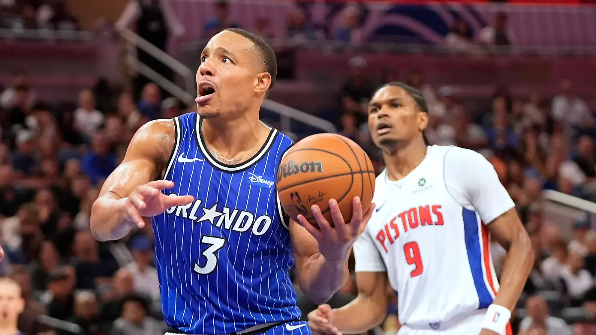 Orlando-Magic-guard-Desmond-Bane-3-looks-for-a-shot-as-he-gets-in-front-of-Detroit-Pistons-guard-Ausar-Thompson-9-during-the-second-half-of-an-NBA-basketball-game-Monday-April-6-2026-in-Orlando-Fla