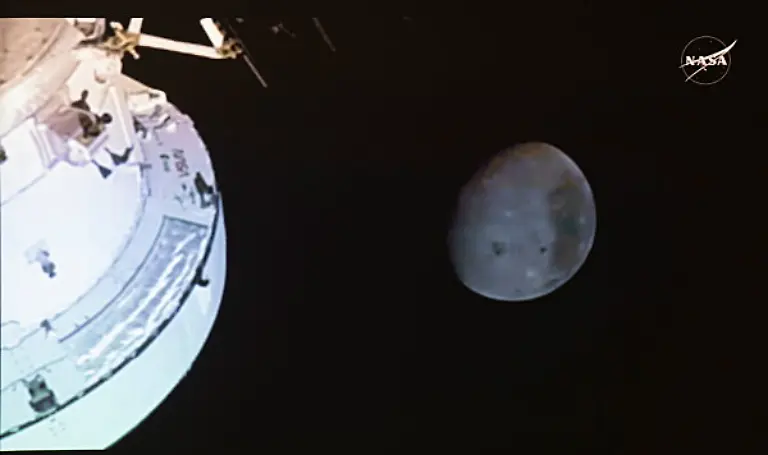 April-6-2026-Longueuil-Pq-CANADA-The-moon-is-seen-from-Artemis-II-mission-as-astronauts-including-Canadian-Jeremy-Hansen-make-a-record-breaking-lunar-flyby-on-a-live-feed-at-the-Canadian-Space-Agency-headquarters-in-Longueuil-Que-on-Monday-April-6-2026