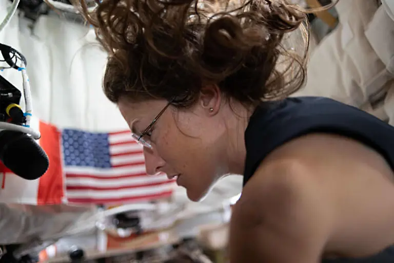 April-6-2026-Orion-Capsule-Outer-Space-NASA-astronaut-and-Artemis-II-mission-specialist-Christina-Koch-prepping-for-lunar-flyby-activities-after-completing-aerobic-exercise-on-the-flywheel-device-during-the-fourth-day-aboard-the-Orion-spacecraft-to-the-far-side-of-the-Moon-April-4-2026-from-Space