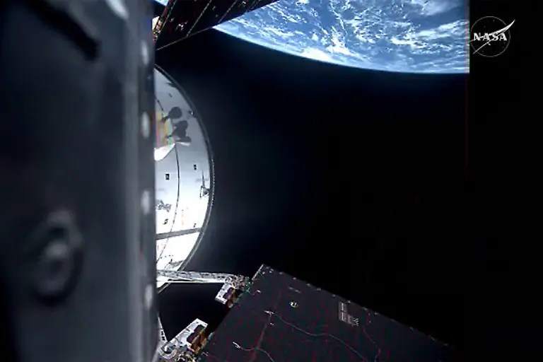 A-view-of-the-Earth-s-horizon-from-NASA-s-Orion-spacecraft-as-it-orbits-above-the-planet-during-the-first-hours-of-the-Artemis-II-test-flight-NASA-astronauts-Commander-Reid-Wiseman-Pilot-Victor-Glover-and-Mission-Specialist-Christina-Koch-and-CSA-Canadian-Space-Agency-astronaut-Mission-Specialist-Jeremy-Hansen-launched-at-6-35-p-m-EDT-on-Wednesday-April-1-2026-on-an-approximately-10-day-mission-around-the-Moon-and-back-to-Earth