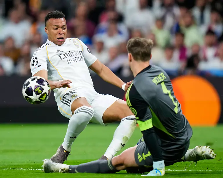 ESP-Real-Madrid-v-Bayern-Munich-UEFA-Champions-League-Quarter-Finals-First-Leg-Kylian-Mbappe-of-Real-Madrid-CF-and-Manuel-Neuer-of-FC-Bayern-Munchen-during-the-UEFA-Champions-League-match-between-Real-Madrid-and-Bayern-Munich-Quarter-Finals-first-leg-played-at-Santiago-Bernabeu-Stadium-on-April-7-2026-in-Madrid-Spain
