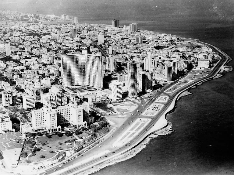 FILE-This-Jan-23-1958-file-photo-shows-the-U-S-embassy-first-building-at-right-next-to-the-sea-among-skyscrapers-hotels-and-apartment-buildings-that-line-the-Malecon-seafront-in-Havana-Cuba-The-building-first-opened-as-an-embassy-in-1953-the-same-year-Fidel-Castro-launched-an-ill-fated-assault-on-a-barracks-that-is-considered-the-onset-of-the-Cuban-Revolution-After-the-break-in-diplomatic-relations-in-1961-Washington-was-without-a-presence-in-Cuba-until-1977-The-U-S-and-Cuba-announced-on-Dec-17-2014-they-are-re-establishing-full-diplomatic-relations