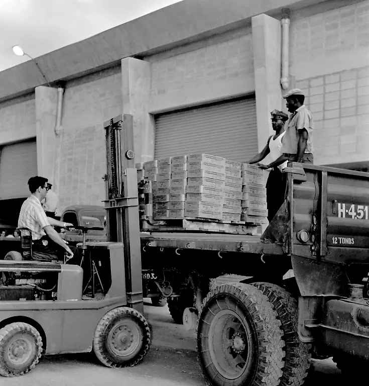 A-forklift-operator-loads-boxes-onto-a-truck-during-the-negotiations-to-free-prisoners-captured-by-Cuban-forces-after-the-attempted-invasion-of-the-Bay-of-Pigs-1961