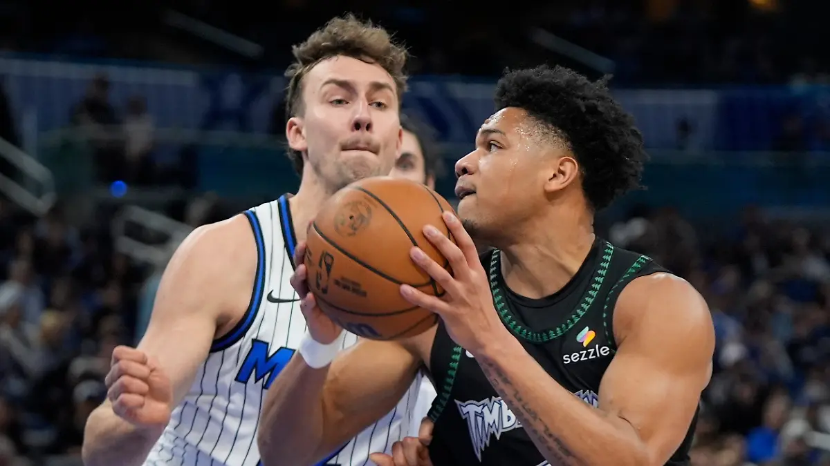 Minnesota-Timberwolves-guard-Terrence-Shannon-Jr-right-goes-to-the-basket-against-Orlando-Magic-forward-Franz-Wagner-left-during-the-first-half-of-an-NBA-basketball-game-Wednesday-April-8-2026-in-Orlando-Fla