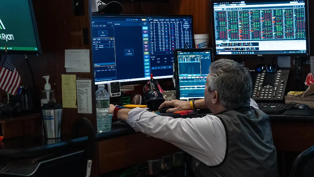 A-trader-works-on-the-floor-of-the-New-York-Stock-Exchange-NYSE-in-New-York-NY-on-April-2-2026-Stock-market-continues-to-slide-into-the-red-as-oil-prices-going-up-US-and-Israel-continue-military-campaign-against-Iran-and-Iran-and-its-proxies-Hezbollah-and-Houthis-pounding-Israel-and-Iran-retaliates-against-neighboring-Arab-countries