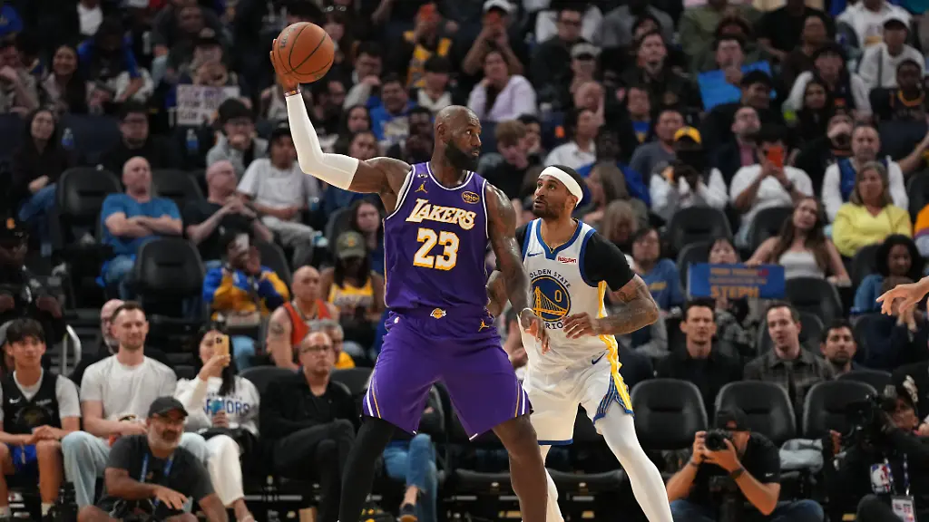 Apr-9-2026-San-Francisco-California-USA-Los-Angeles-Lakers-forward-LeBron-James-23-holds-onto-the-ball-next-to-Golden-State-Warriors-guard-Gary-Payton-II-0-in-the-third-quarter-at-the-Chase-Center