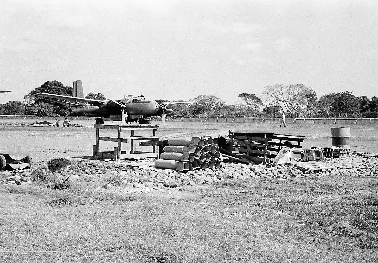 A-B26-plane-is-parked-on-the-airstrip-at-the-amystery-basea-in-Retalhuleu-Guatemala-on-Jan-8-1961-A-number-of-bombs-is-stacked-in-foreground-Guatemala-denies-the-base-in-being-used-to-launch-an-invasion-of-Cuba-aThere-are-no-aggressive-intentions-in-connection-with-the-activities-at-Retalhuleu-a-the-Guatemalan-defense-minister-says-athey-are-just-routine-activities-by-the-Guatemalan-army
