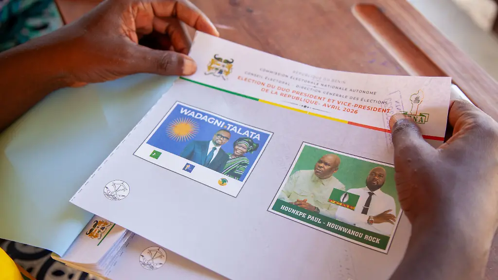 An-electoral-official-prepares-the-presidential-ballot-papers-at-a-polling-station-in-Cotonou-Benin-Sunday-April-12-2026