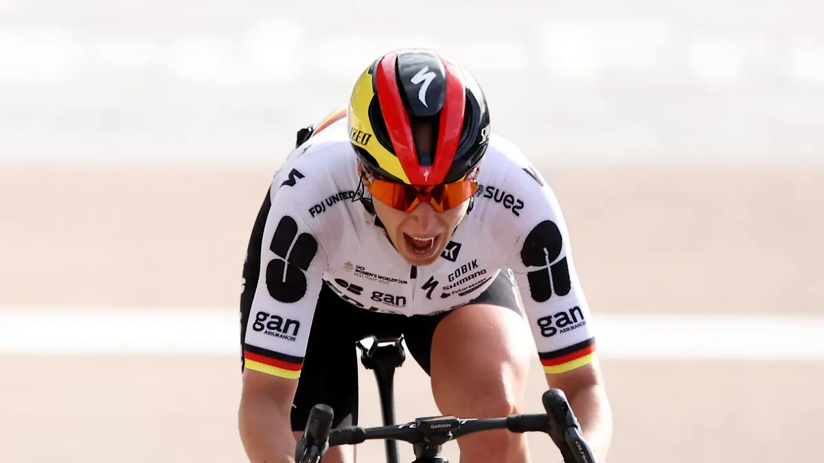 Cycling-Paris-Roubaix-Femmes-Paris-France-April-12-2026-FDJ-United-SUEZ-s-Franziska-Koch-celebrates-after-crossing-the-finish-line-to-win-the-2026-Paris-Roubaix-Femmes-REUTERS-Christian-Hartmann